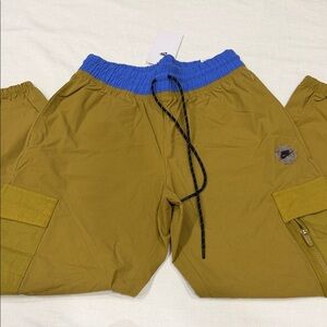 Nike Woman Cargo Pants in Blue and Tan